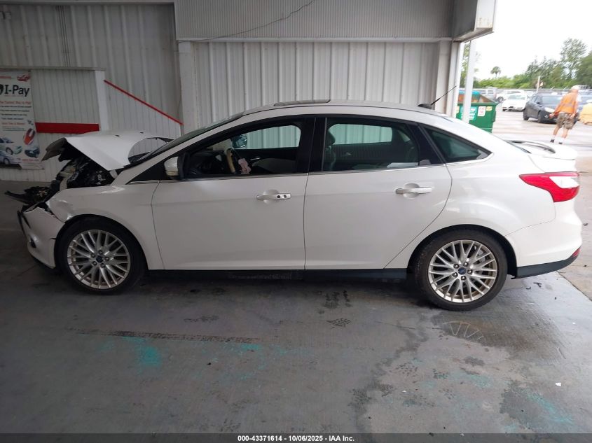 2014 Ford Focus Titanium VIN: 1FADP3J2XEL106711 Lot: 43371614