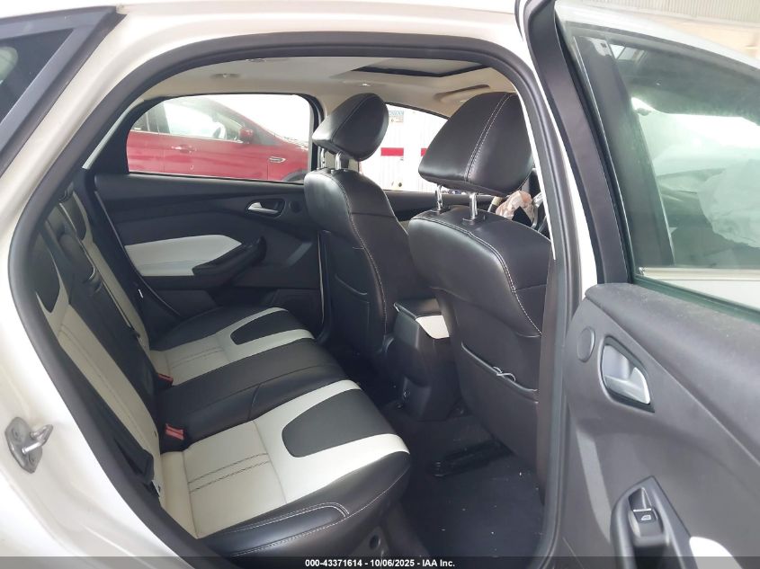 2014 Ford Focus Titanium VIN: 1FADP3J2XEL106711 Lot: 43371614