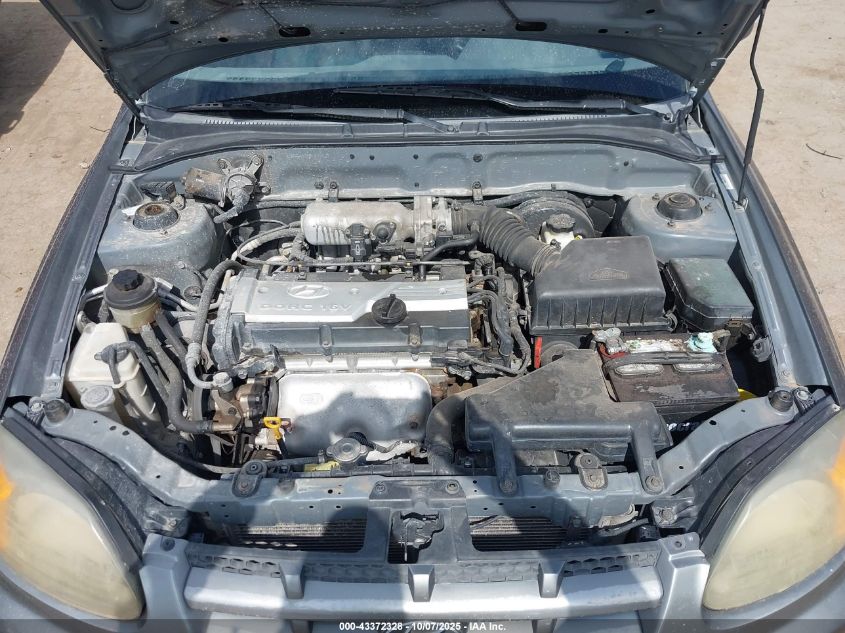 2005 Hyundai Accent Gls VIN: KMHCG45C85U604815 Lot: 43372328