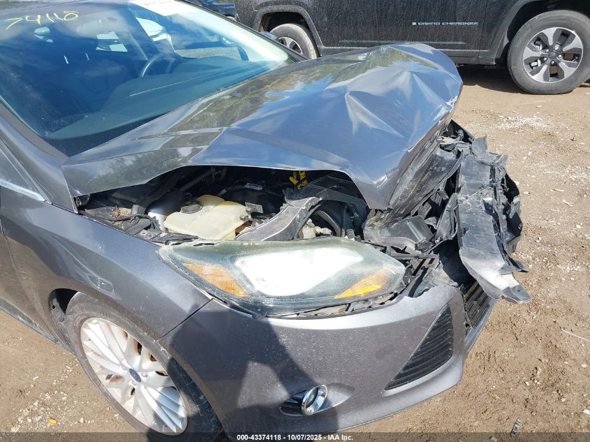 2014 Ford Focus Titanium VIN: 1FADP3N29EL438598 Lot: 43374118