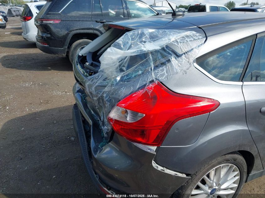 2014 Ford Focus Titanium VIN: 1FADP3N29EL438598 Lot: 43374118