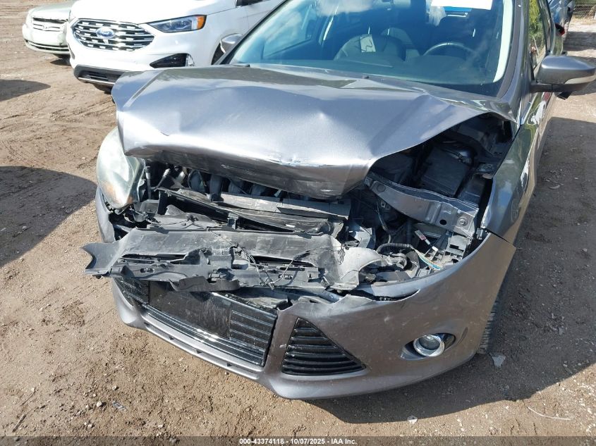 2014 Ford Focus Titanium VIN: 1FADP3N29EL438598 Lot: 43374118