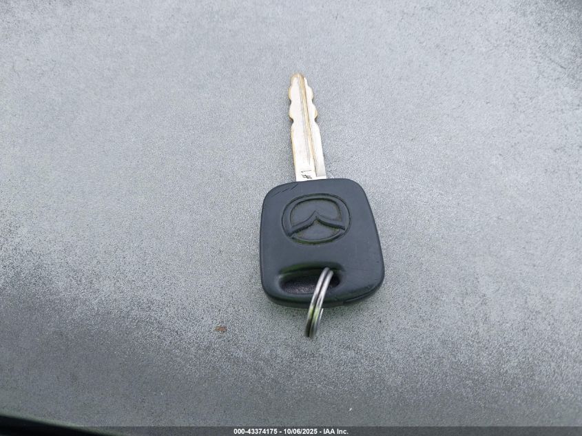 2003 Mazda Tribute Es V6 VIN: 4F2CZ06123KM41057 Lot: 43374175