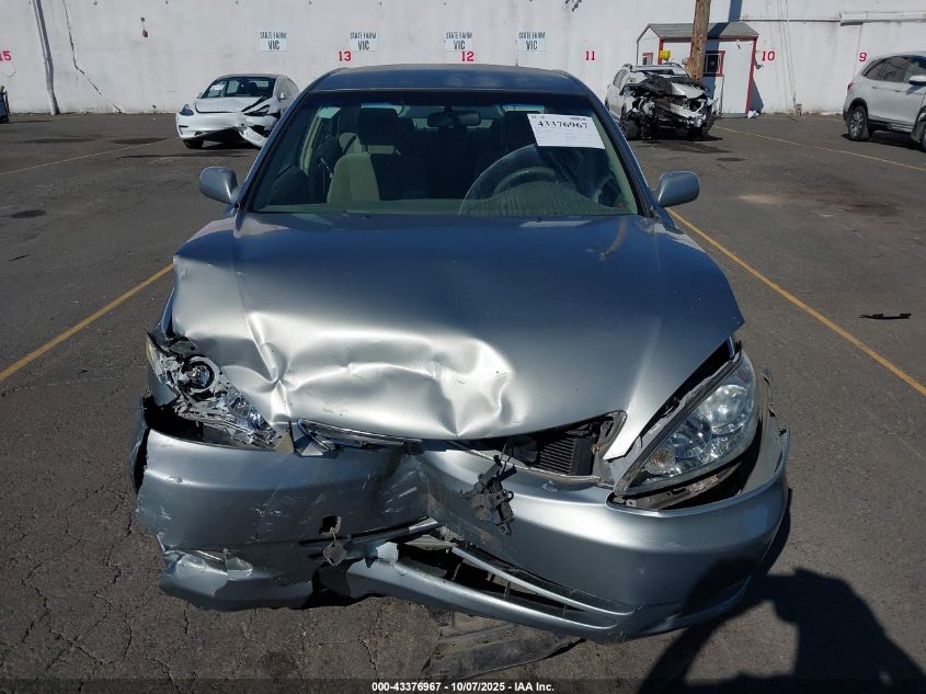 2005 Toyota Camry Le VIN: JTDBE30K553000871 Lot: 43376967