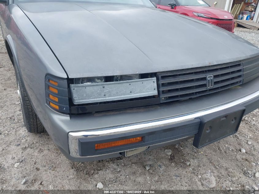 1987 Oldsmobile Toronado Brougham VIN: 1G3EZ1135HU306920 Lot: 43377350