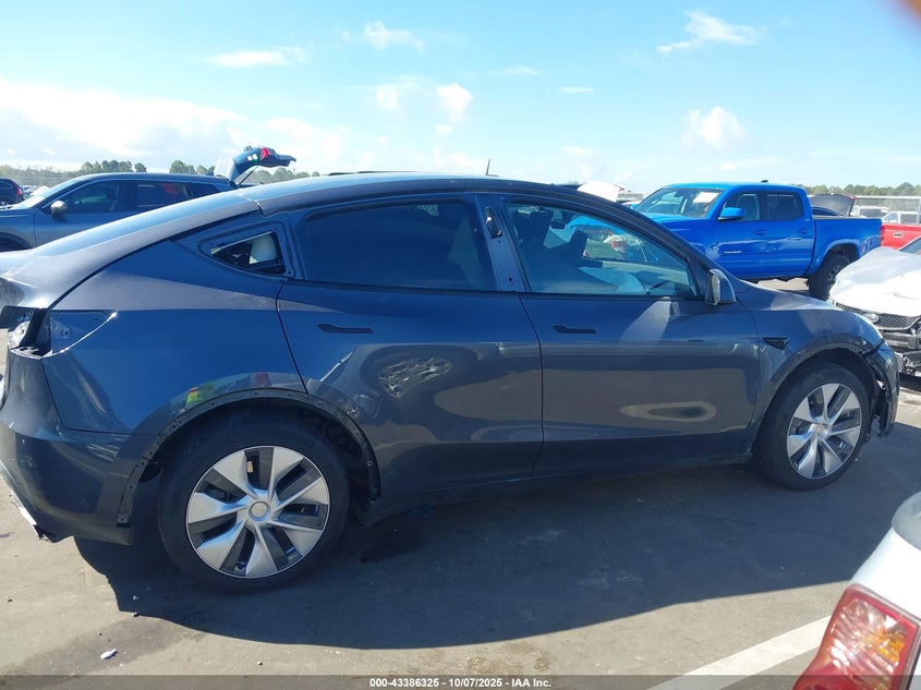 2023 Tesla Model Y Awd/Long Range Dual Motor All-Wheel Drive VIN: 7SAYGDEE7PA152458 Lot: 43386325