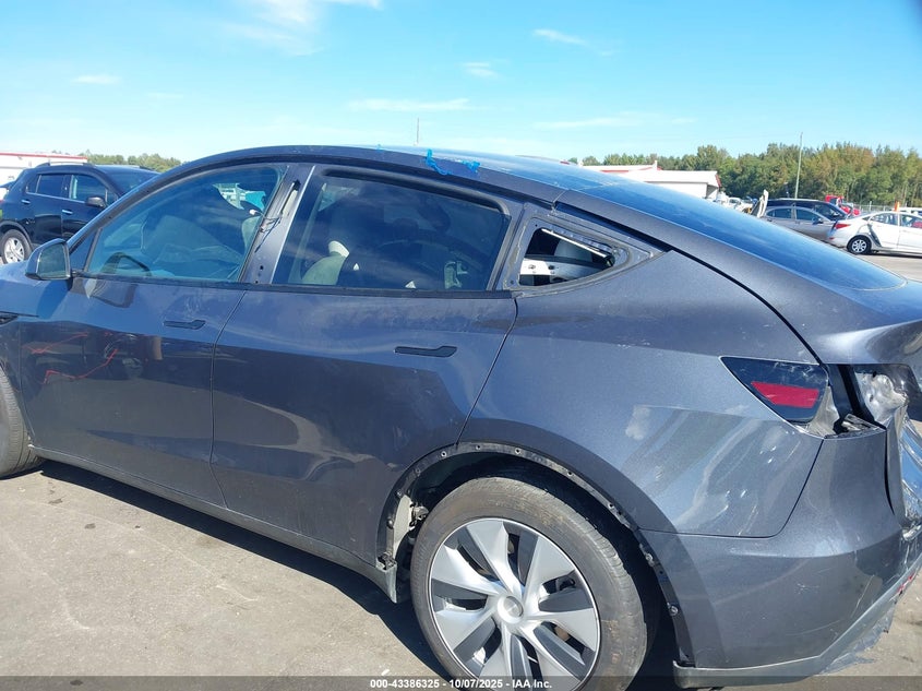 2023 Tesla Model Y Awd/Long Range Dual Motor All-Wheel Drive VIN: 7SAYGDEE7PA152458 Lot: 43386325