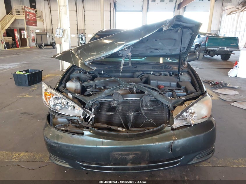 2002 Toyota Camry Le VIN: 4T1BE32K02U606402 Lot: 43388244