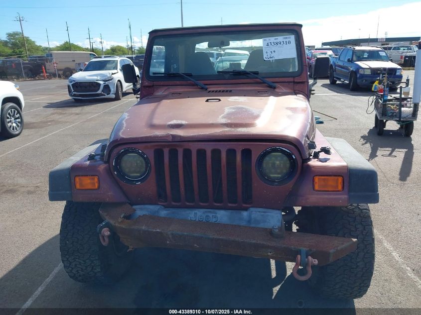 2002 Jeep Wrangler Sahara VIN: 1J4FA59S62P711621 Lot: 43389310