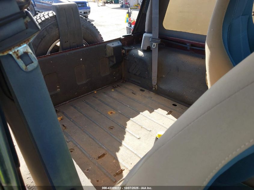 2002 Jeep Wrangler Sahara VIN: 1J4FA59S62P711621 Lot: 43389310