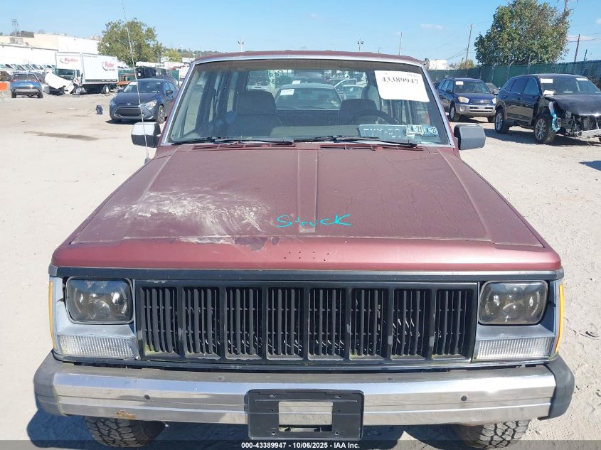 1988 Jeep Cherokee VIN: 1JCHR7811JT061063 Lot: 43389947