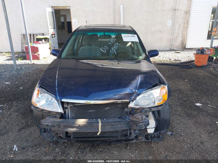 2003 Honda Civic Ex VIN: 2HGES26723H589909 Lot: 43393088