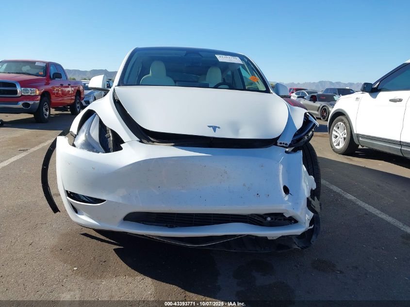 2023 Tesla Model Y Awd/Long Range Dual Motor All-Wheel Drive VIN: 7SAYGDEE1PF826879 Lot: 43393771
