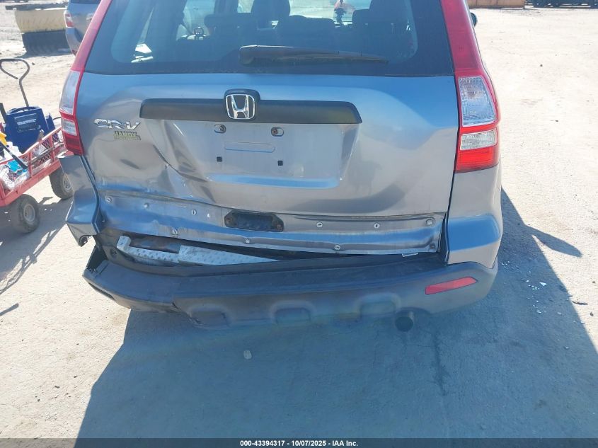 2009 Honda Cr-V Lx VIN: JHLRE48369C021173 Lot: 43394317