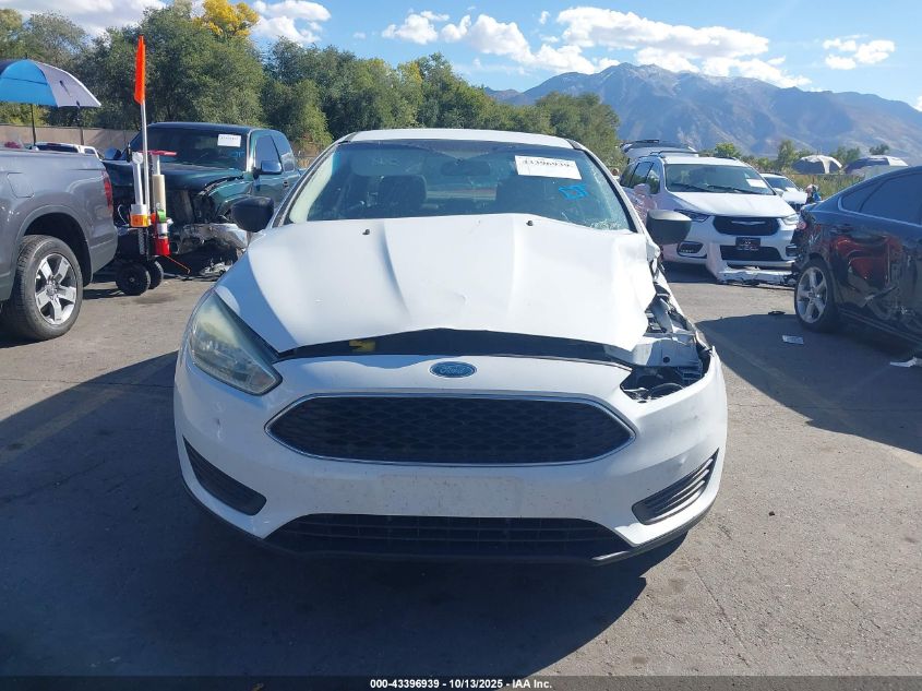 2015 Ford Focus S VIN: 1FADP3E21FL324158 Lot: 43396939