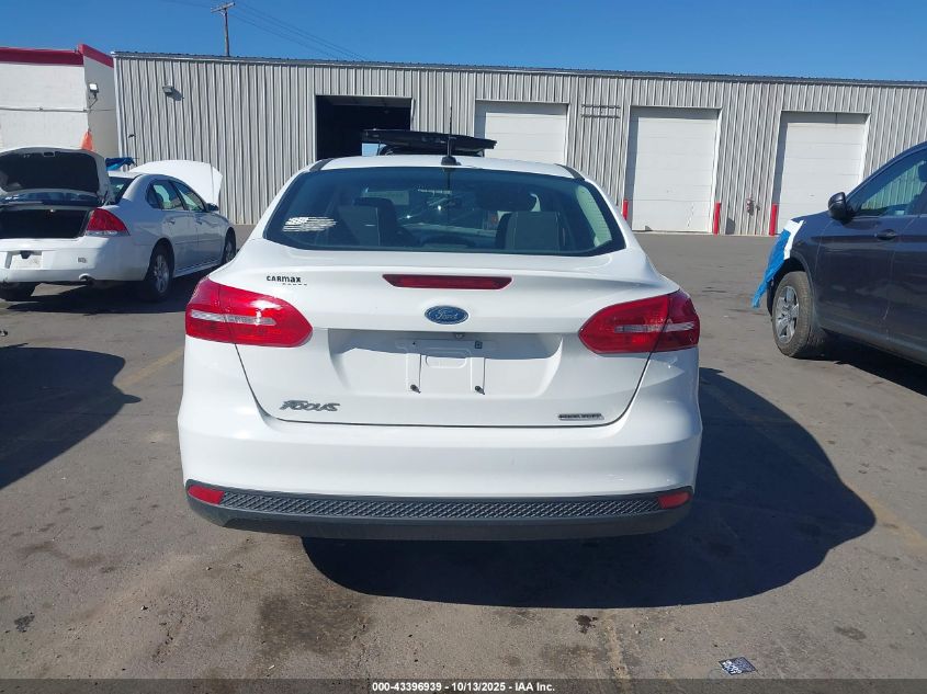 2015 Ford Focus S VIN: 1FADP3E21FL324158 Lot: 43396939