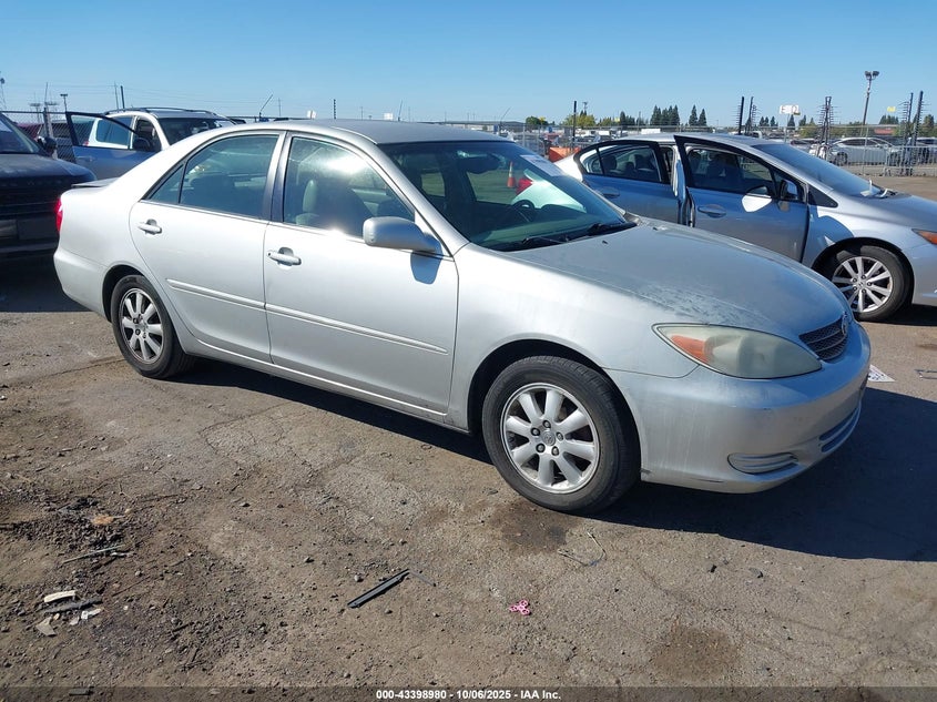 2002 Toyota Camry Xle VIN: 4T1BE30K42U063056 Lot: 43398980