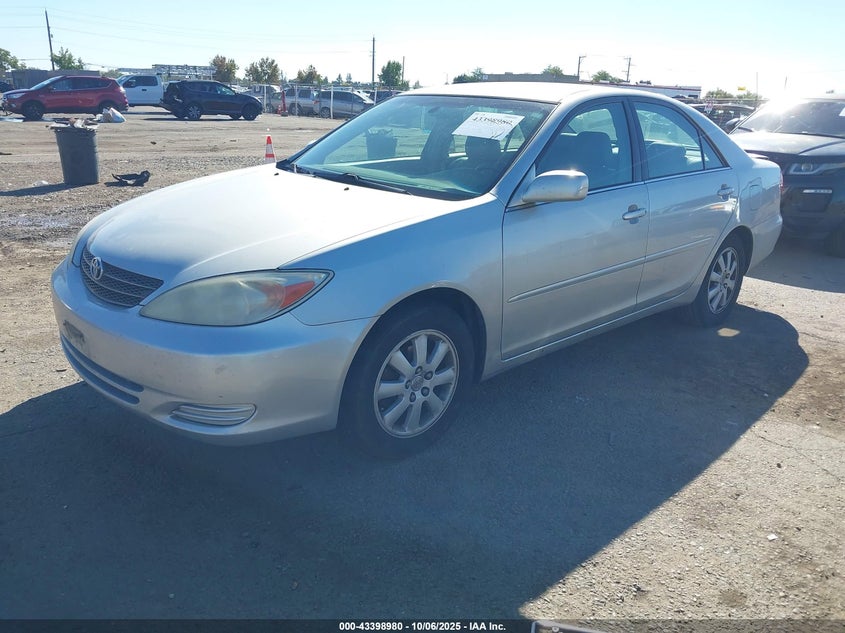 2002 Toyota Camry Xle VIN: 4T1BE30K42U063056 Lot: 43398980
