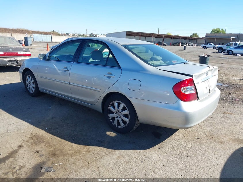 2002 Toyota Camry Xle VIN: 4T1BE30K42U063056 Lot: 43398980