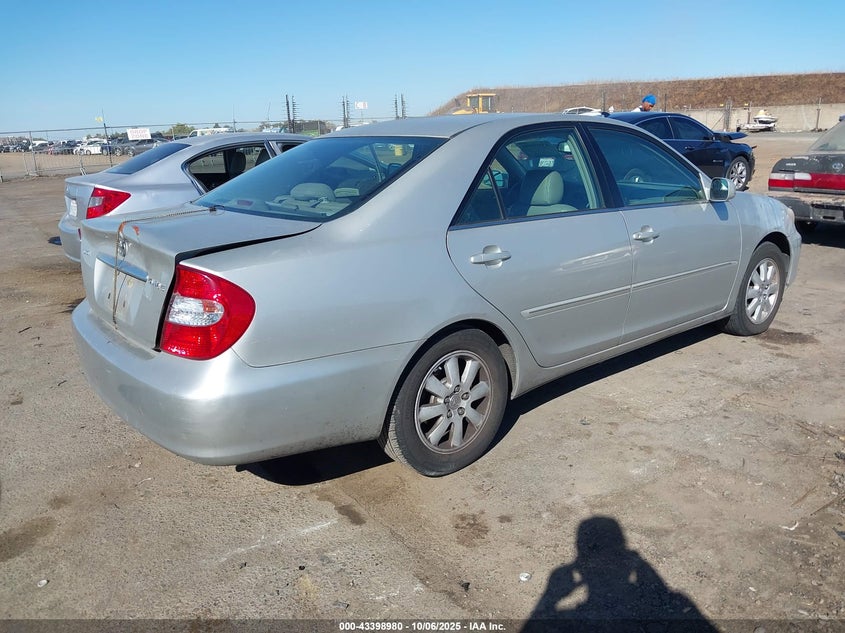 2002 Toyota Camry Xle VIN: 4T1BE30K42U063056 Lot: 43398980