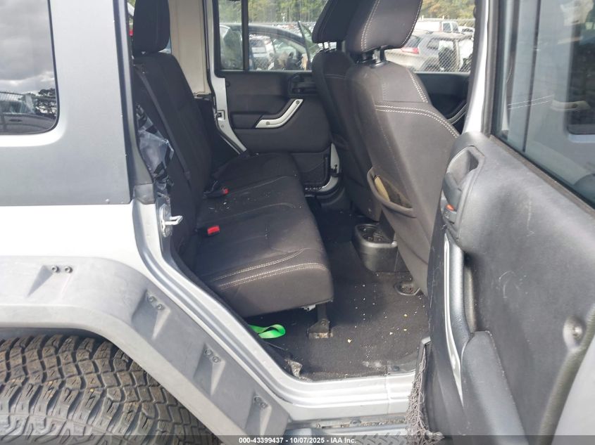 2014 Jeep Wrangler Unlimited Sahara VIN: 1C4BJWEG2EL138028 Lot: 43399437