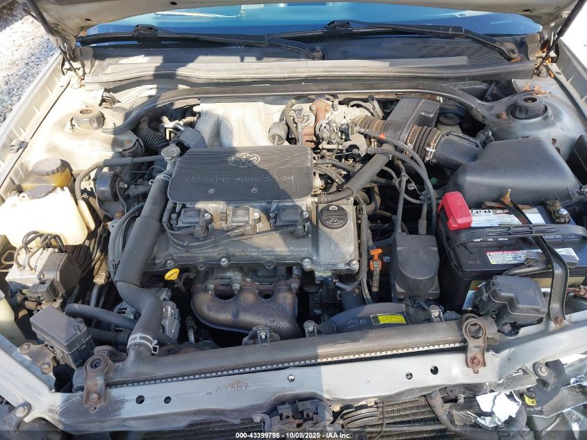 2002 Toyota Camry Solara Sle V6 VIN: 2T1CF28P82C594015 Lot: 43399798