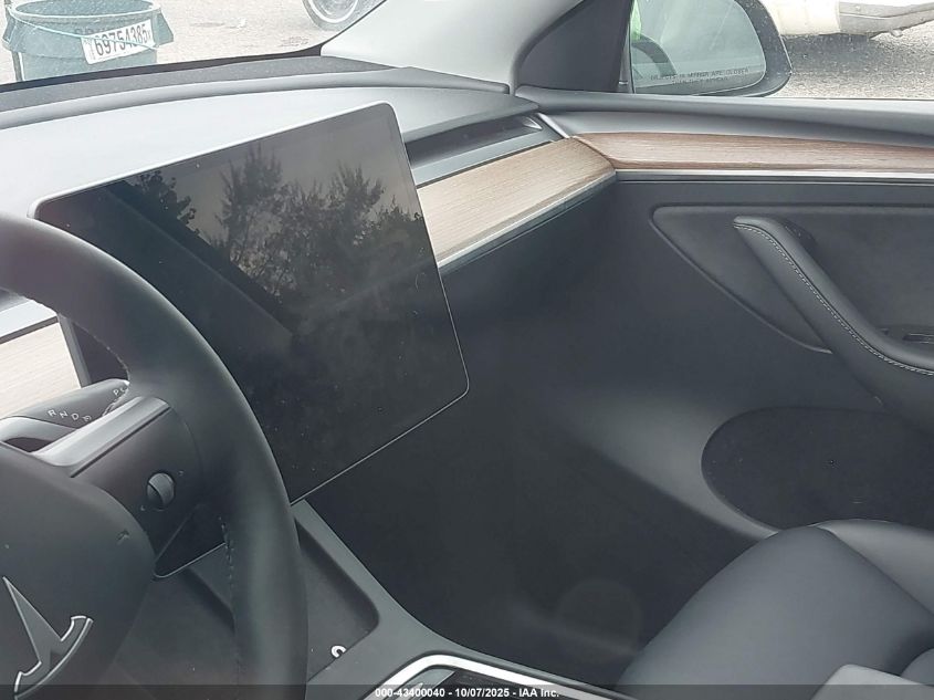 2024 Tesla Model Y VIN: 7SAYGDED2RF166295 Lot: 43400040