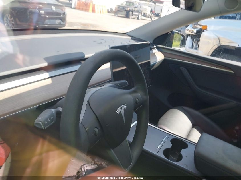 2024 Tesla Model Y Long Range Dual Motor All-Wheel Drive/Rwd VIN: 7SAYGDED8RF197535 Lot: 43400373