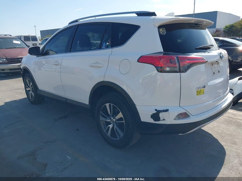 VIN JTMWFREV9JJ207869 2018 TOYOTA RAV4 XLE