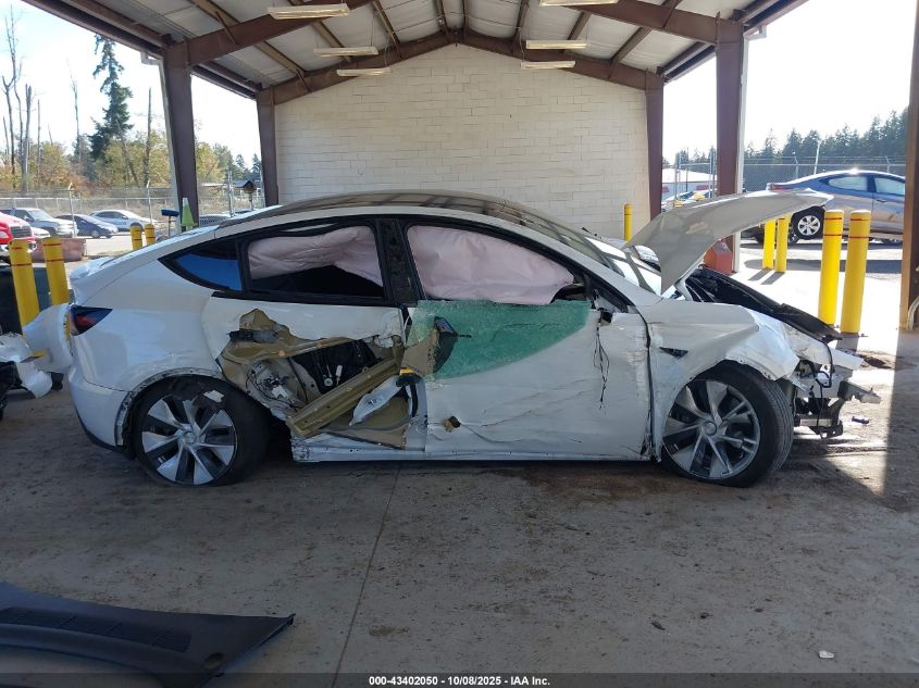 2023 Tesla Model Y Awd/Long Range Dual Motor All-Wheel Drive VIN: 7SAYGDEE9PF805925 Lot: 43402050