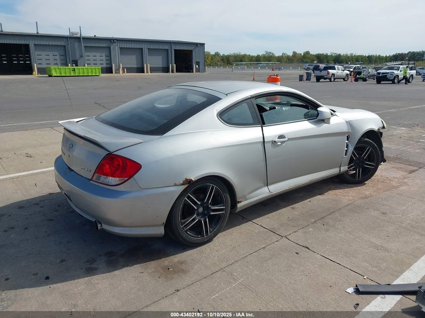 KMHHN65F76U191238 2006 HYUNDAI TIBURON photo no. 4