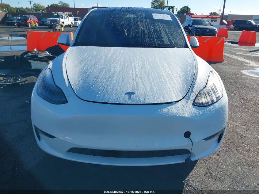 2025 Tesla Model Y Long Range Dual Motor Rear-Wheel Drive VIN: 7SAYGDED2SF219910 Lot: 43402232