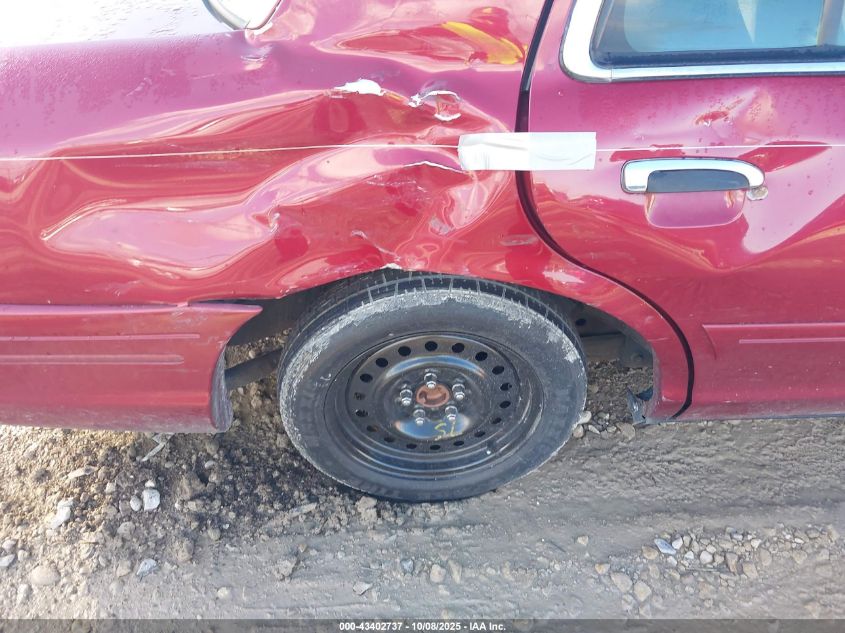 2002 Ford Crown Victoria Lx VIN: 2FAFP74W92X141124 Lot: 43402737