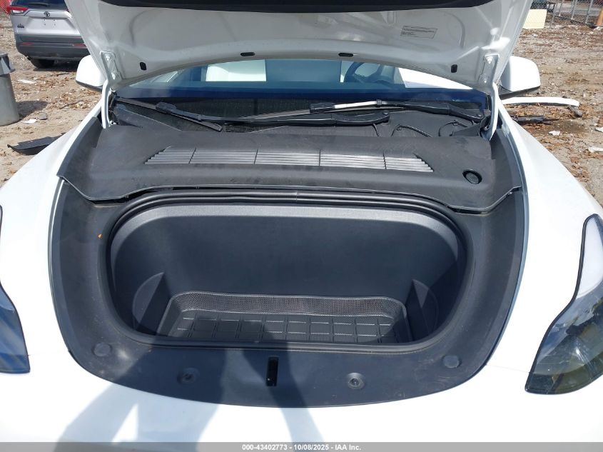 2023 Tesla Model Y VIN: 7SAYGDEE2PF697616 Lot: 43402773