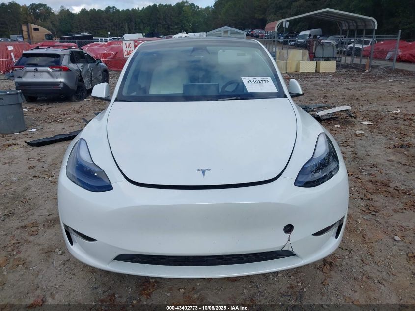 2023 Tesla Model Y VIN: 7SAYGDEE2PF697616 Lot: 43402773