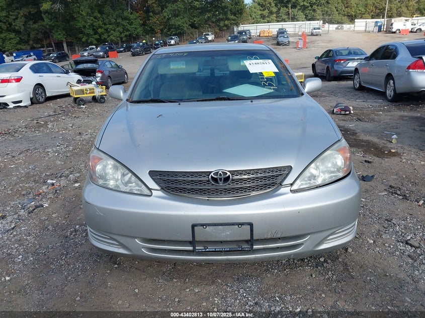 2002 Toyota Camry Le VIN: 4T1BE32KX2U043133 Lot: 43402813