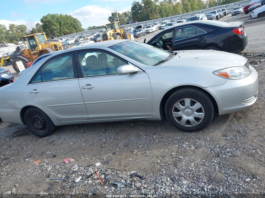 2002 Toyota Camry Le VIN: 4T1BE32KX2U043133 Lot: 43402813