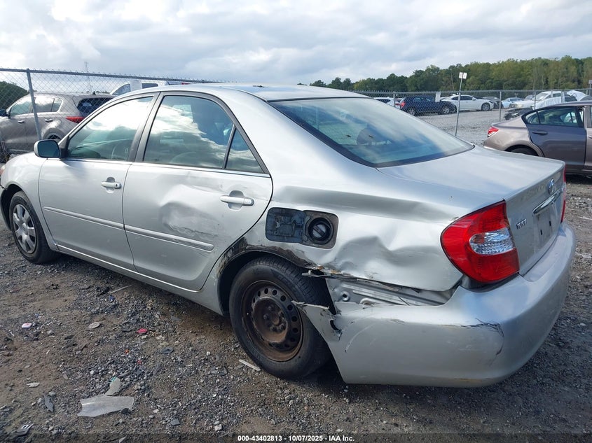 2002 Toyota Camry Le VIN: 4T1BE32KX2U043133 Lot: 43402813