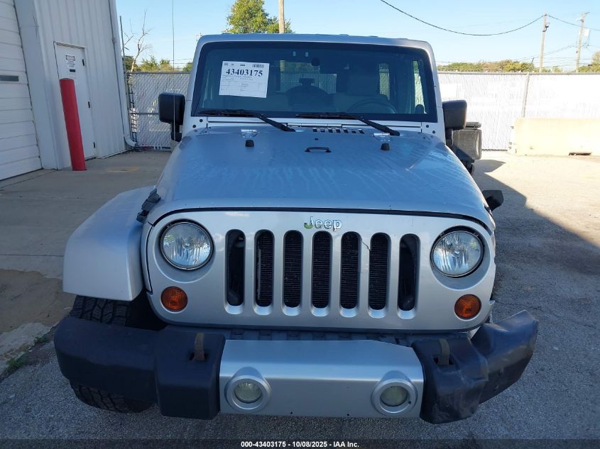 2009 Jeep Wrangler Unlimited Sahara VIN: 1J8GA59199L784610 Lot: 43403175