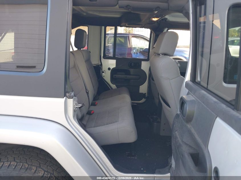 2009 Jeep Wrangler Unlimited Sahara VIN: 1J8GA59199L784610 Lot: 43403175