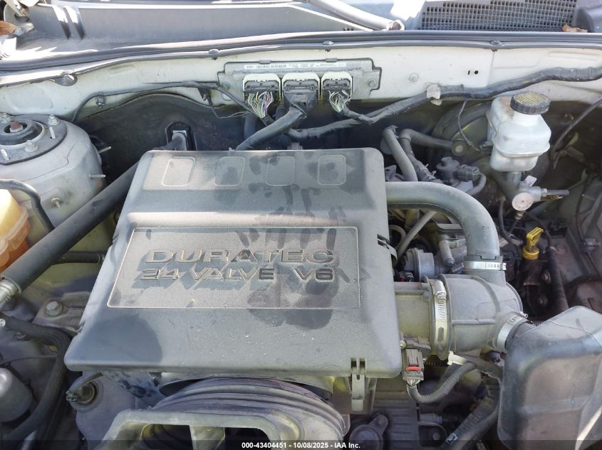 2009 Mercury Mariner V6 VIN: 4M2CU81G29KJ16002 Lot: 43404451