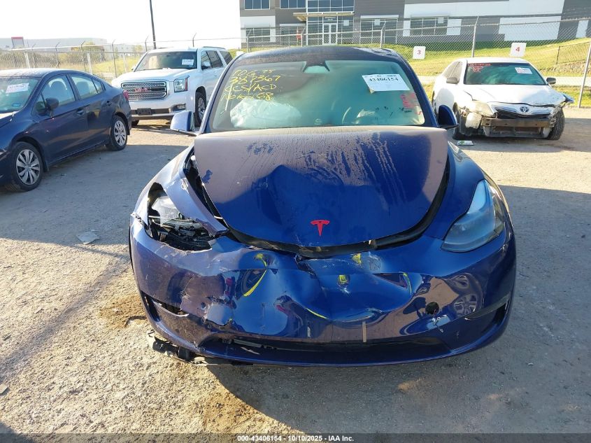 2023 Tesla Model Y Awd/Long Range Dual Motor All-Wheel Drive VIN: 7SAYGAEE5PF701866 Lot: 43406154