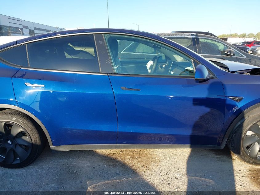 2023 Tesla Model Y Awd/Long Range Dual Motor All-Wheel Drive VIN: 7SAYGAEE5PF701866 Lot: 43406154