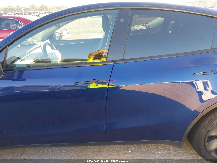 2023 Tesla Model Y Awd/Long Range Dual Motor All-Wheel Drive VIN: 7SAYGAEE5PF701866 Lot: 43406154