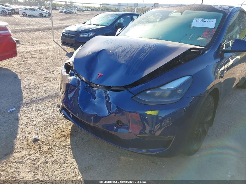 2023 Tesla Model Y Awd/Long Range Dual Motor All-Wheel Drive VIN: 7SAYGAEE5PF701866 Lot: 43406154