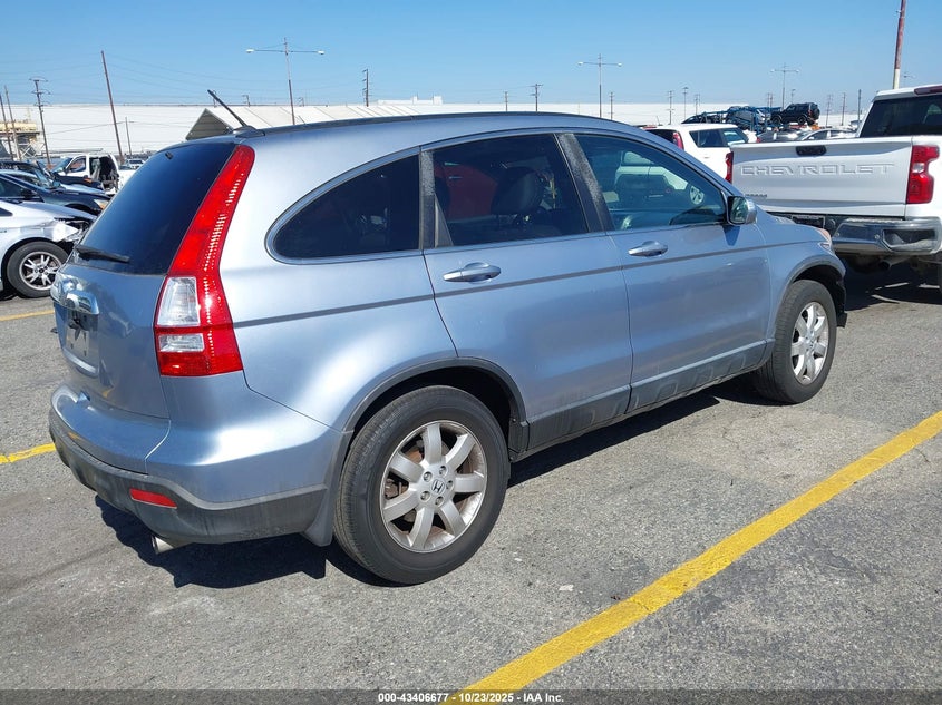 JHLRE38729C012676 2009 HONDA CR-V photo no. 4
