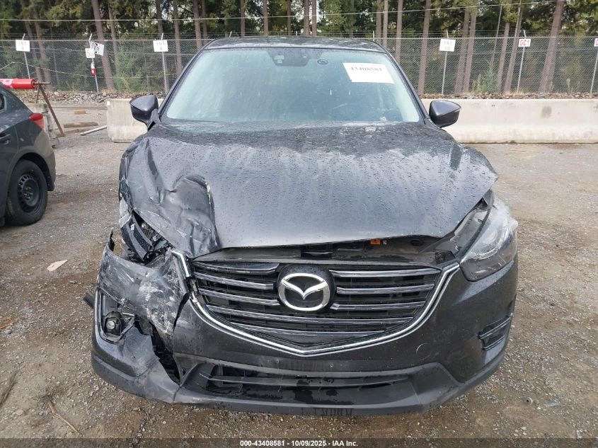 2016 Mazda Cx-5 Grand Touring VIN: JM3KE4DY8G0877306 Lot: 43408581