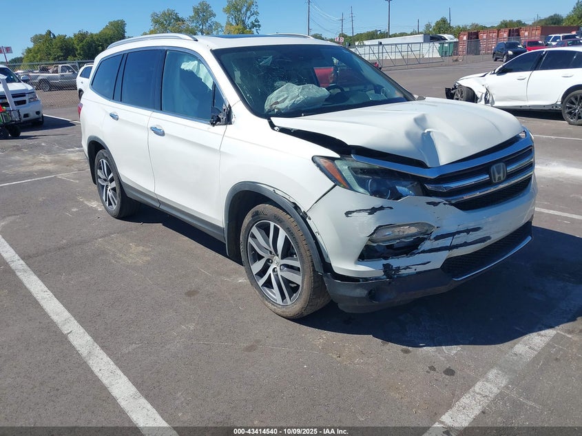 2018 HONDA PILOT TOURING - 5FNYF5H98JB015527