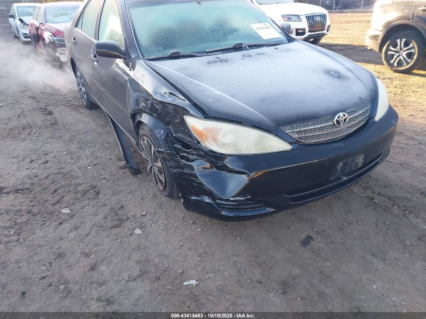 2002 Toyota Camry Le VIN: 4T1BE32K02U563874 Lot: 43415483