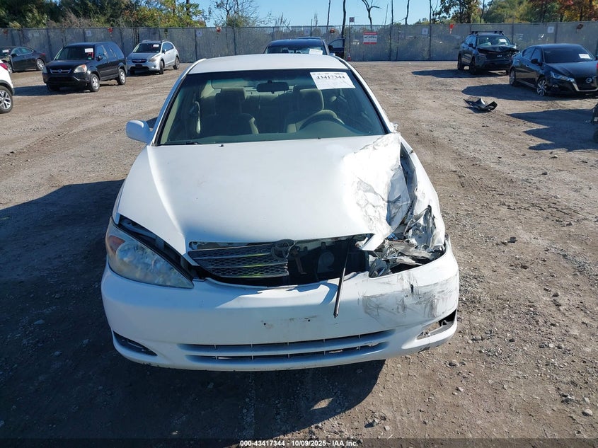 2002 Toyota Camry Le VIN: 4T1BE32K82U042045 Lot: 43417344